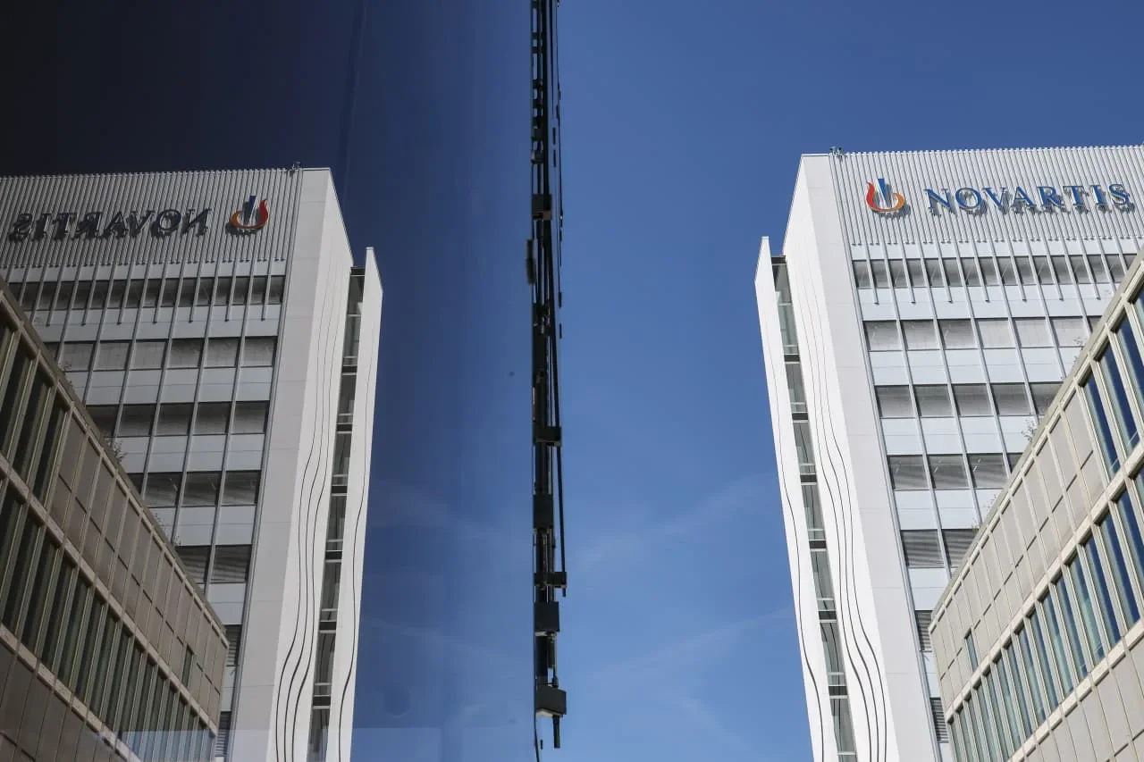 Novartis Trial Failure Sparks Biopharma Rout as Gulf Tensions Push Toman to 229,000