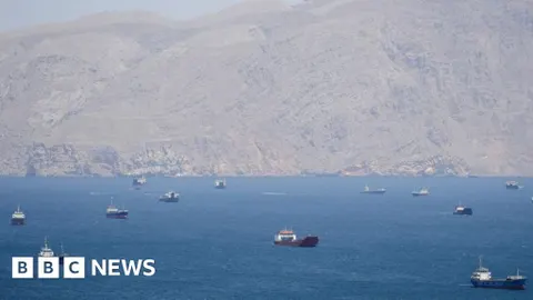 Trump Targets Global Shipping as Toman Hits 183,100; NATO Fractures Over Iran War
