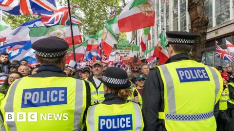 London Protests Ignite Security Alert as Gold Prices Ease and Pezeshkian Signals Diplomatic Softening