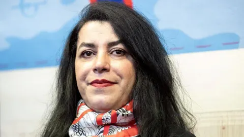 Marjane Satrapi Dies at 56; US House Rebukes Trump on Iran War Powers; Gold Nudges Higher