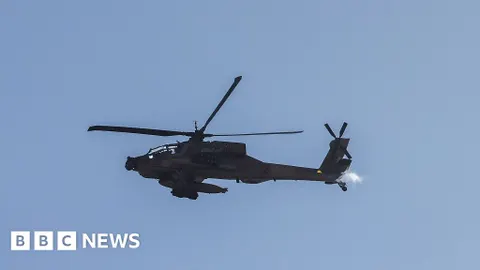 Trump Vows Retaliation as Apache Downed in Hormuz; Toman and Gold Defy Tensions with Surprise Retreat