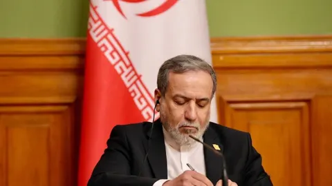 Iran Warns IAEA as Bahrain Blast Rocks Manama; Belfast Riots Simmer