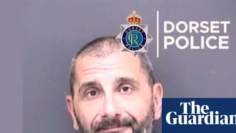 British Fugitive Arrested in Suitcase Murder as Toman Plummets 4.9% Amid Regional Missile Strikes