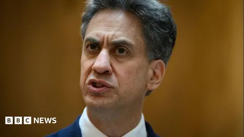 Miliband Urges Hormuz Reopening Amid Tensions; China's AI Surges in Africa
