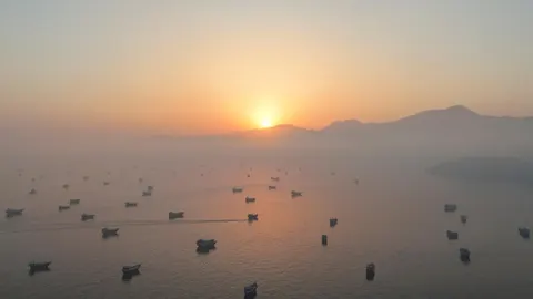 Strait of Hormuz Tensions Flare: Oil Tanker Hit by Explosions Amid Iran-Oman Deal Buzz