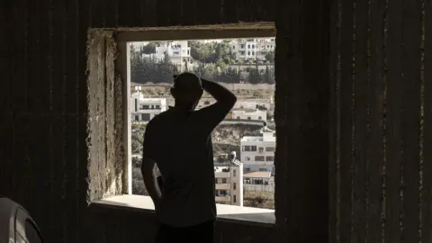 Israel Raids Hebron, AI Models Split on Politics, Gold Dips Amid Tensions