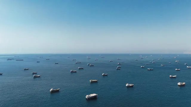 Hormuz Drone Clash Triggers USD Spike; Smoke Clouds Putin’s Economic Forum; EV Tariff Crisis Looms in Europe